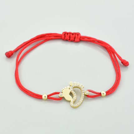 Bransoletka na sznurku złote stópki