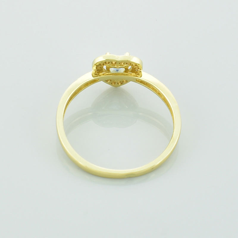 Złoty pierścionek z topazem serce i białymi cyrkoniami.