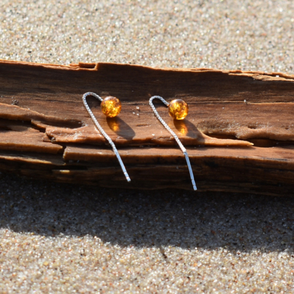 Srebrne przekładane kolczyki z bursztynem