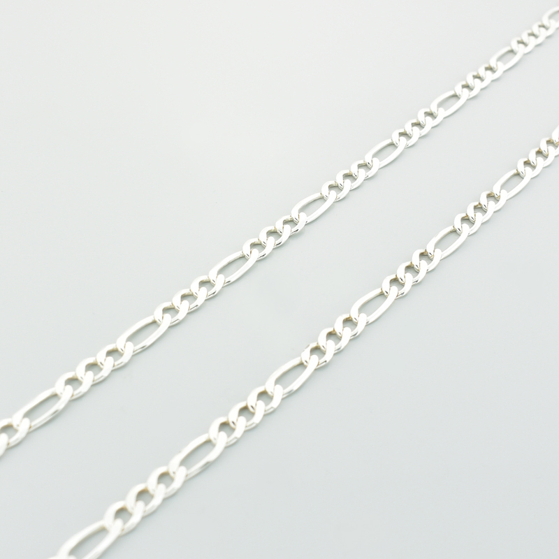 srebrny łańcuszek figaro 60 cm o splocie figaro i 60 cm długości.