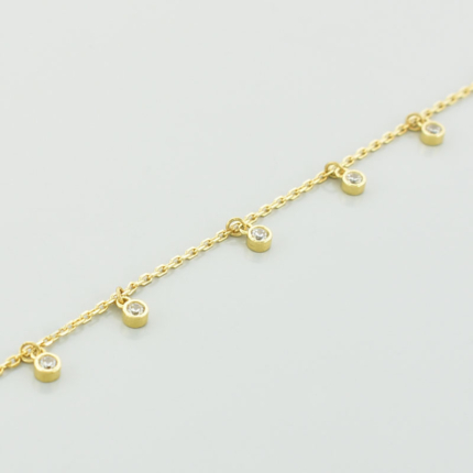 Złota bransoletka łańcuszkowa z cyrkoniami