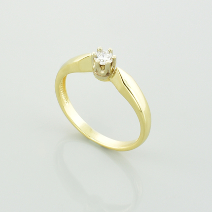 Złoty pierścionek z brylantem 0,33 ct