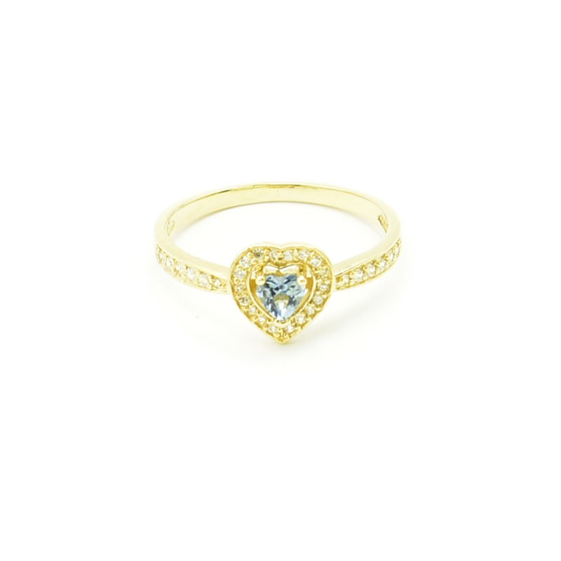 Złoty pierścionek z topazem w kształcie serca.